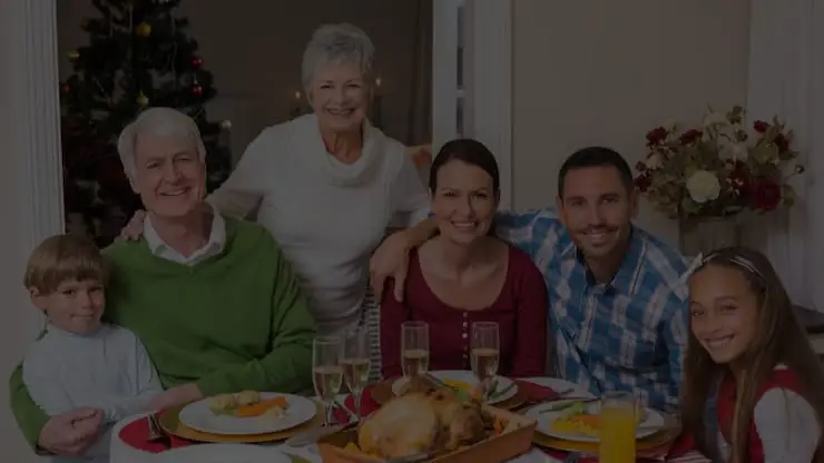 Family gathered for a holiday dinner with guidance from a Los Angeles anxiety therapist to manage stress and build connection.