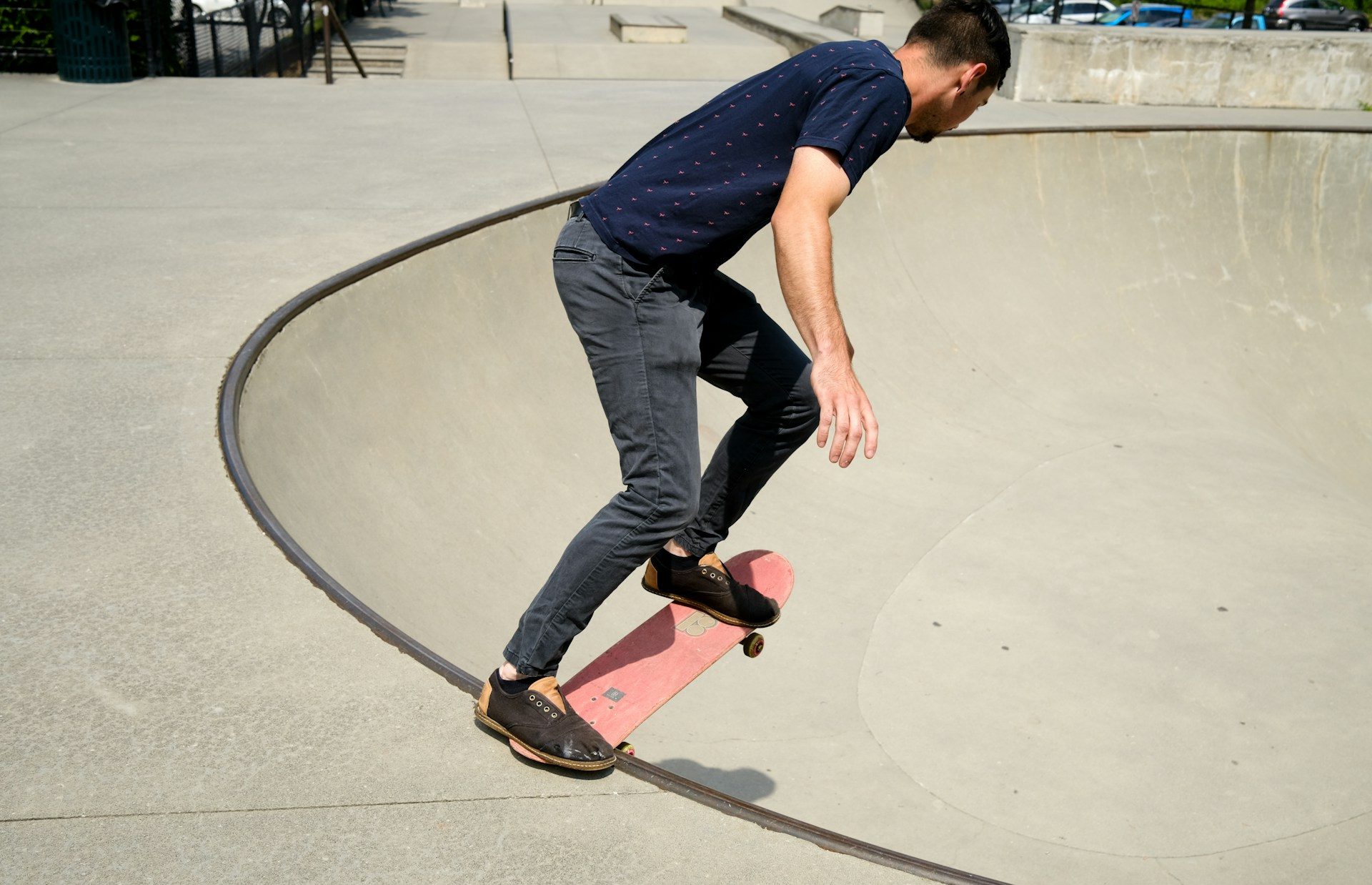 Adult man skateboarding outdoors, reflecting the importance of play for adult mental health