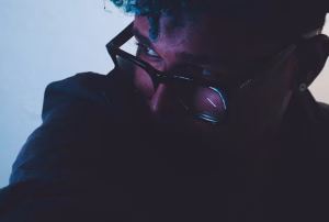 A man in glasses illustrating subconscious Fears That Sabotage Emotional Healing