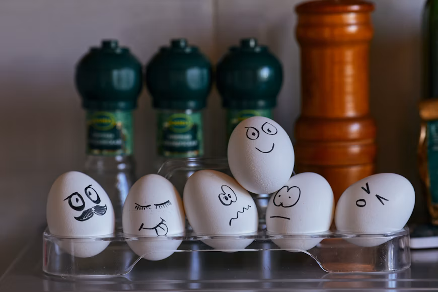 Eggs with different emotions illustrating subconscious Fears That Sabotage Emotional Healing