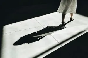 Someone walking away illustrating shadow work.